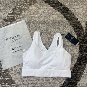 Brand new NVGTN white sports bra